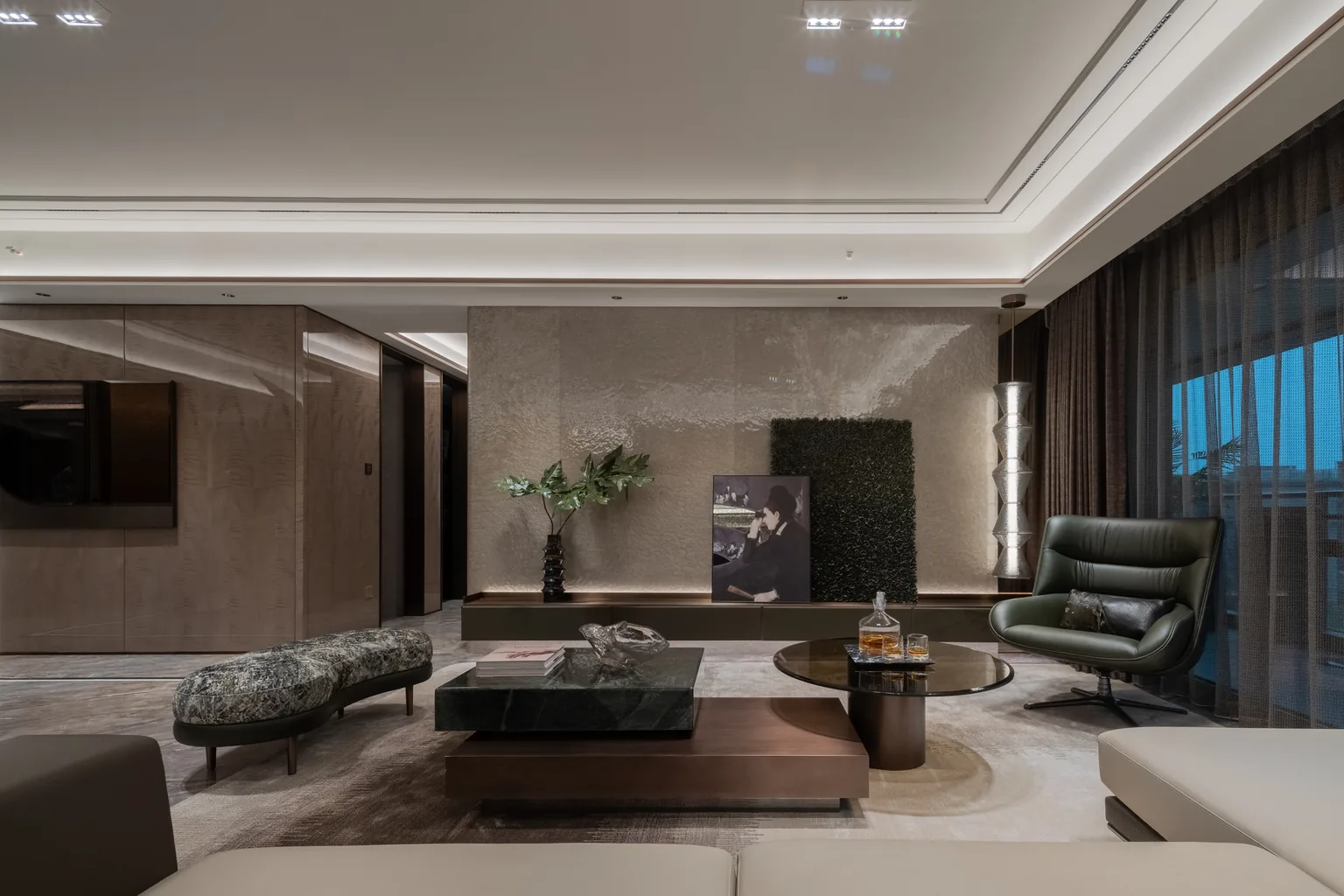 Kuala Lumpur apartment living room with stone wall panels and coordinated furniture