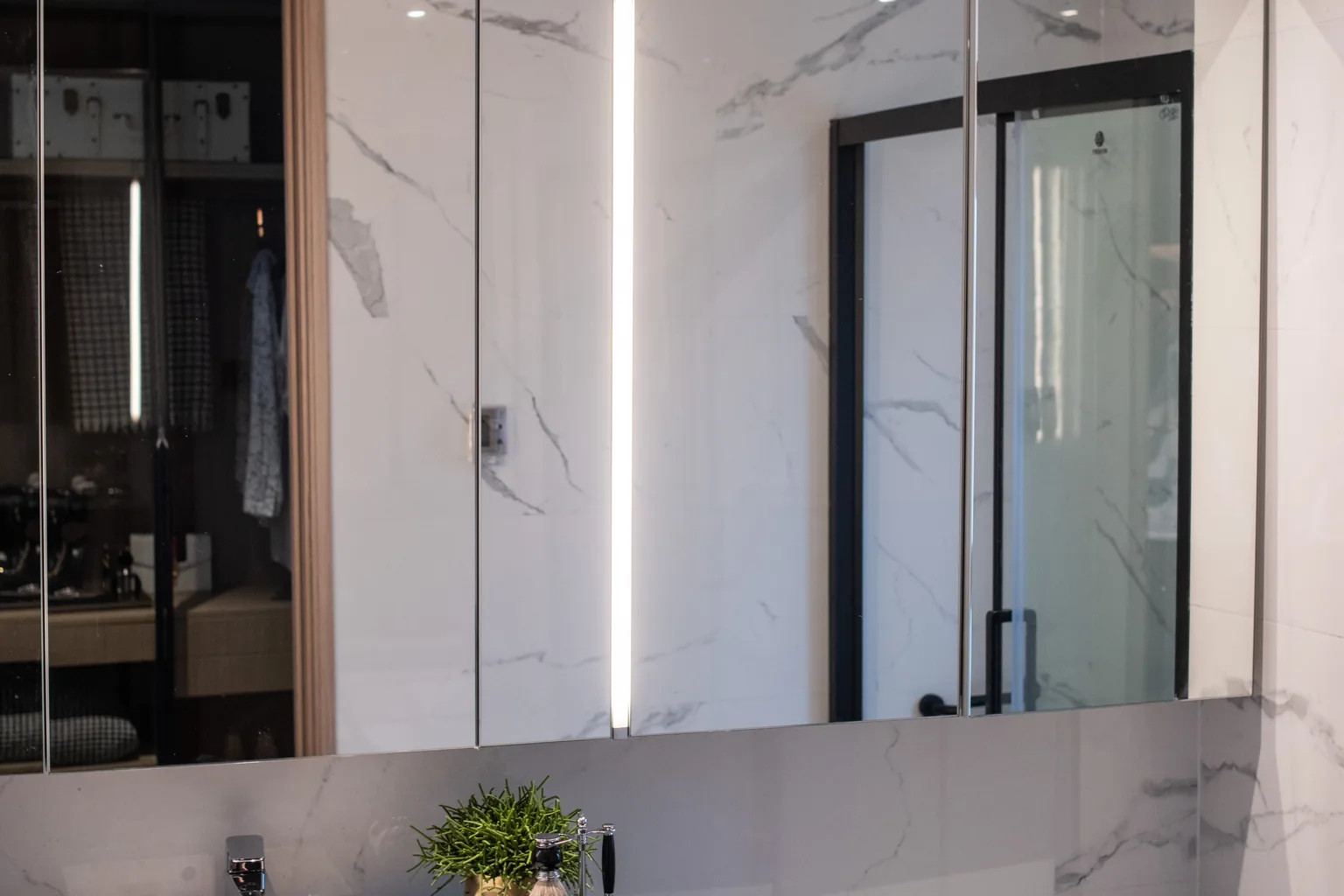 Bristol United Kingdom residence bathroom with stone and glass finishes