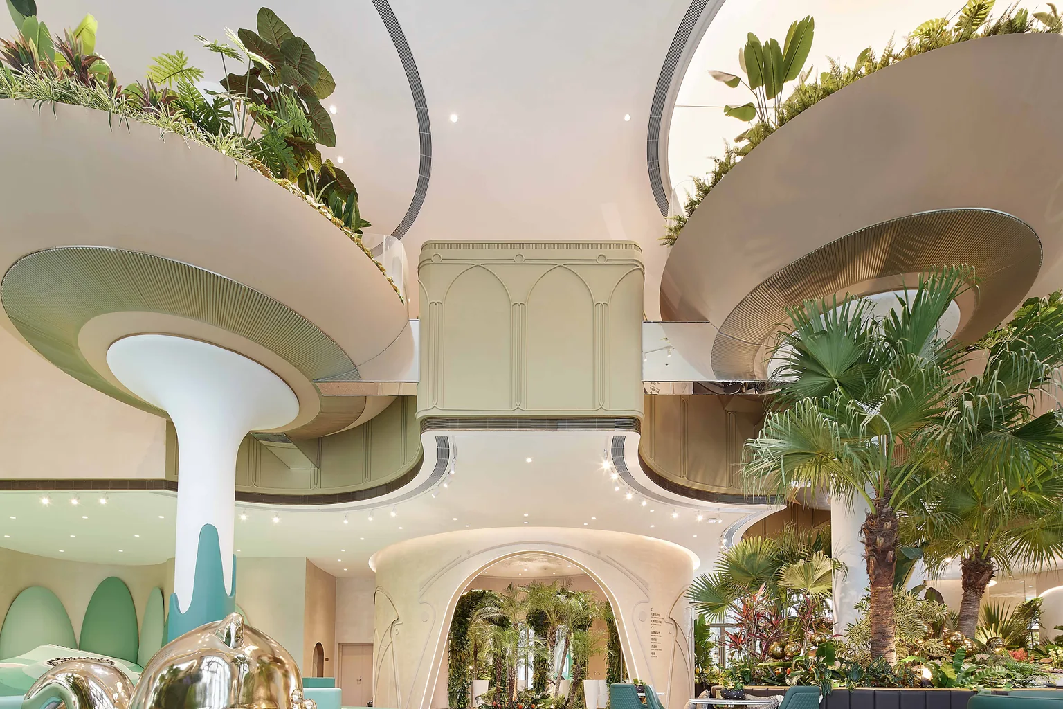 Completed Foshan commercial experience center interior with arches and planting
