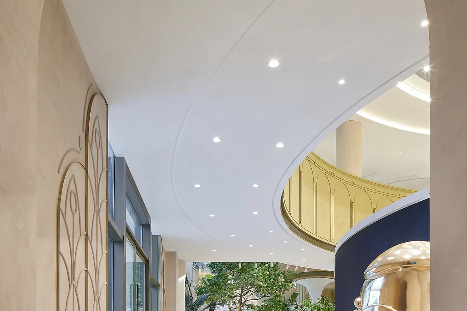 Foshan commercial entrance with curved ceiling and architectural metalwork