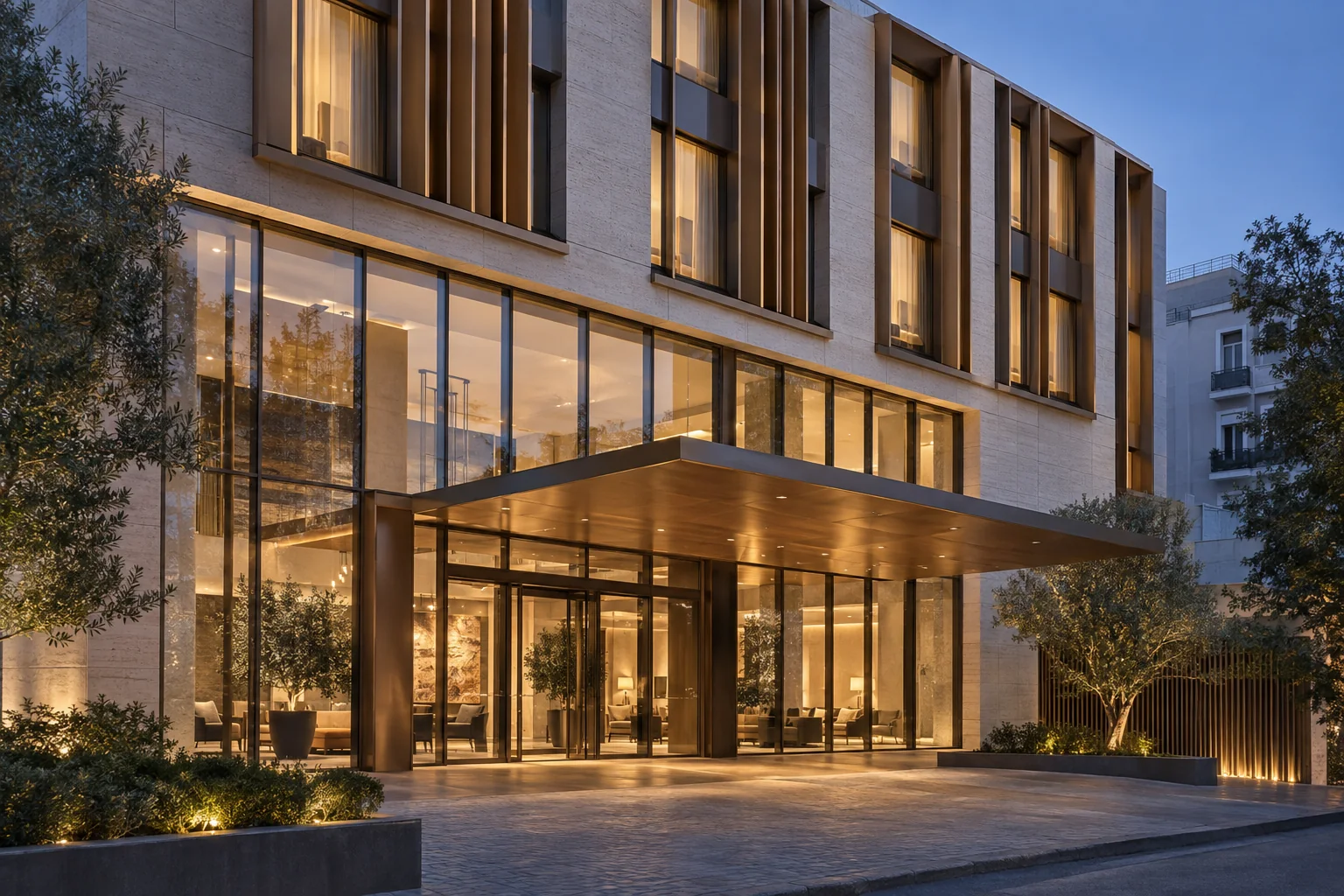 Boutique hotel entrance with curtain wall canopy and vertical aluminum fins