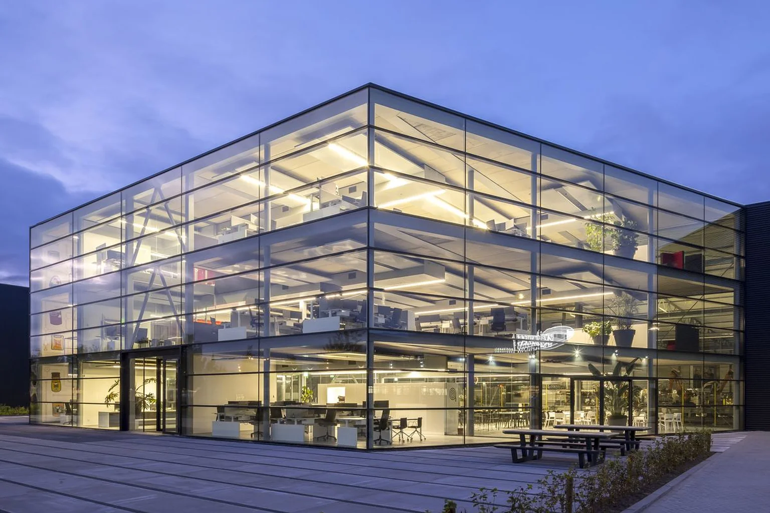 Stick-built glass curtain wall on a modern building exterior
