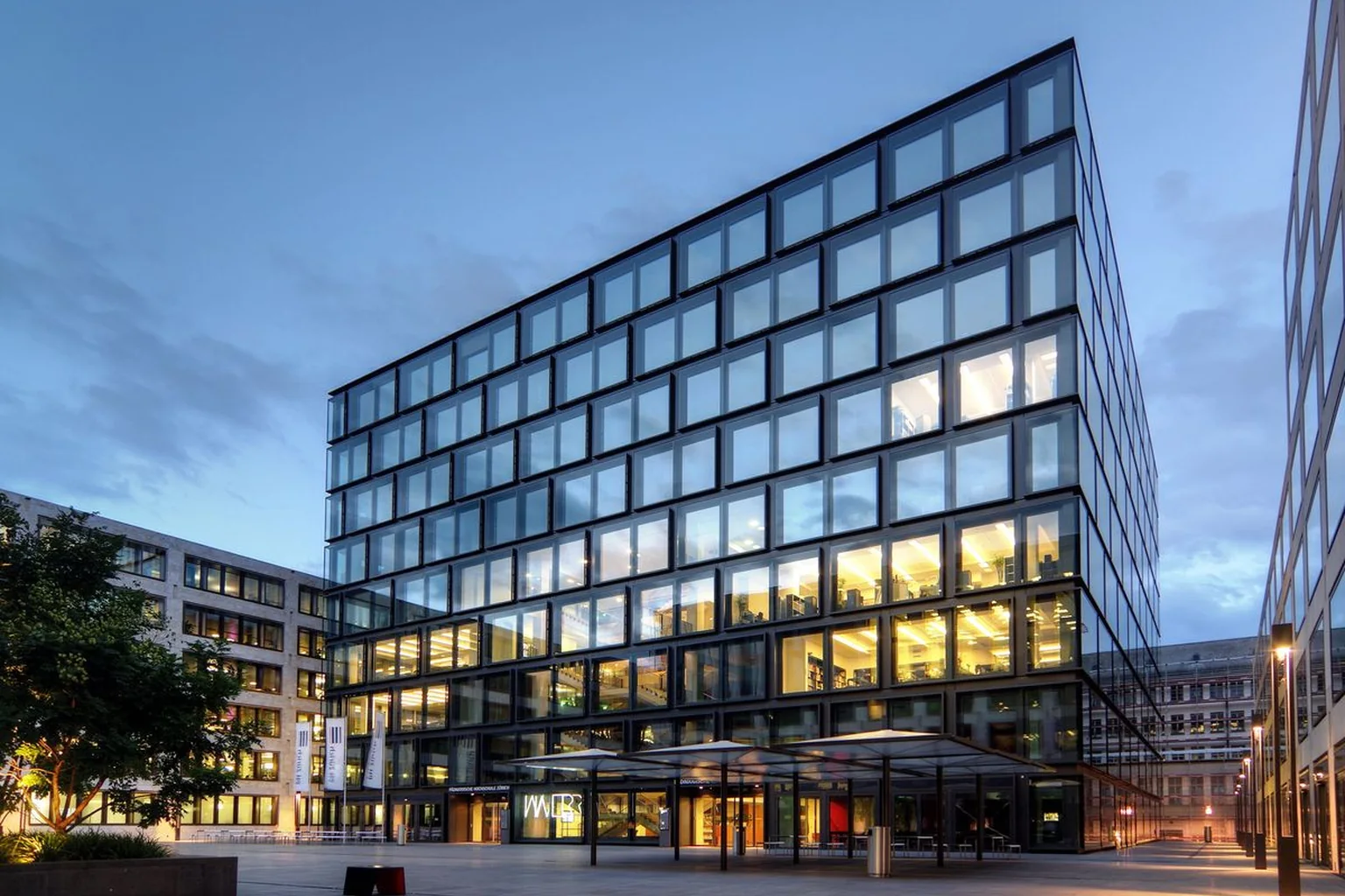 Unitized glass curtain wall modules on a multi-storey tower