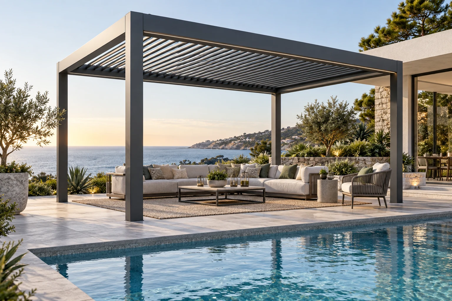 Freestanding louvered aluminum pergola beside a modern pool