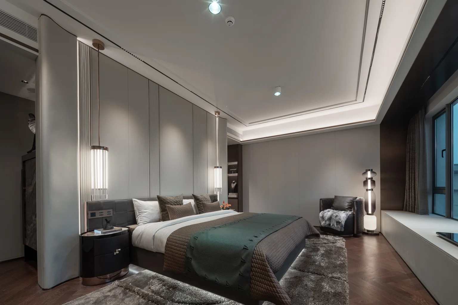 Built-in hinged wardrobe fitted along a bedroom wall