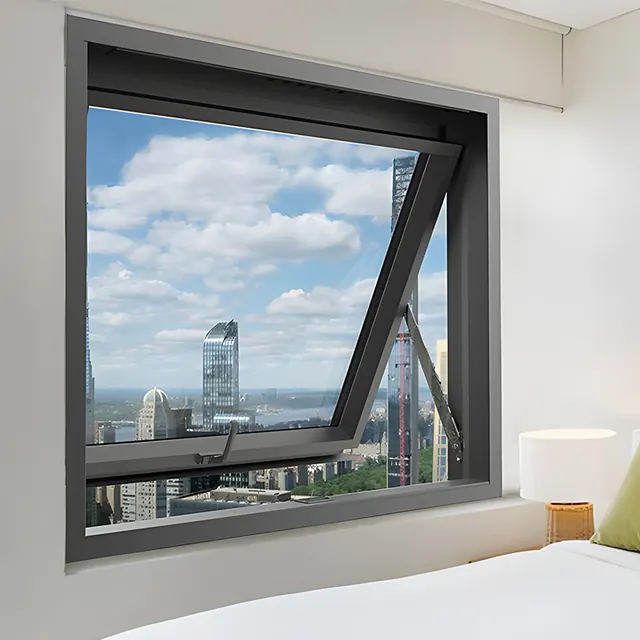 Dark aluminum top-hung awning window opened for controlled ventilation