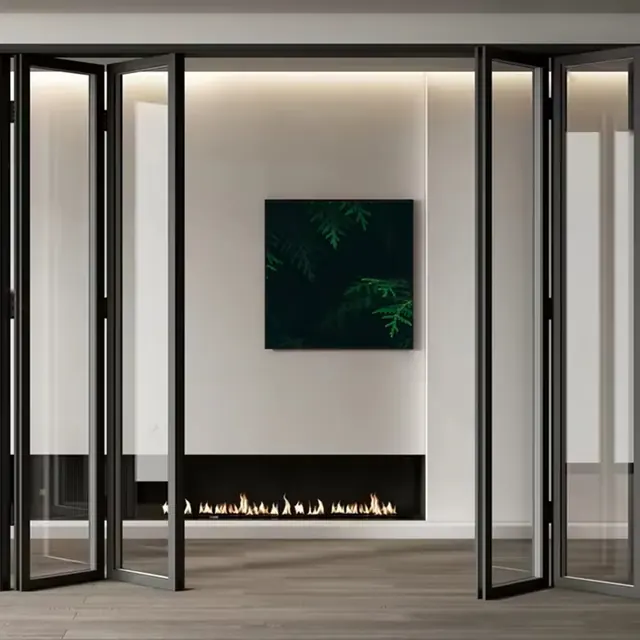 Black aluminum bi-fold glass doors folded open across a wide interior opening