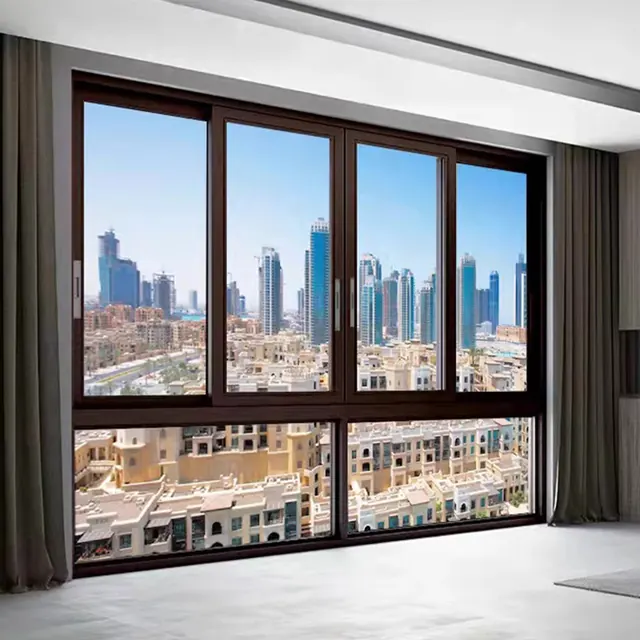 Dark aluminum multi-panel sliding windows overlooking an urban residential district
