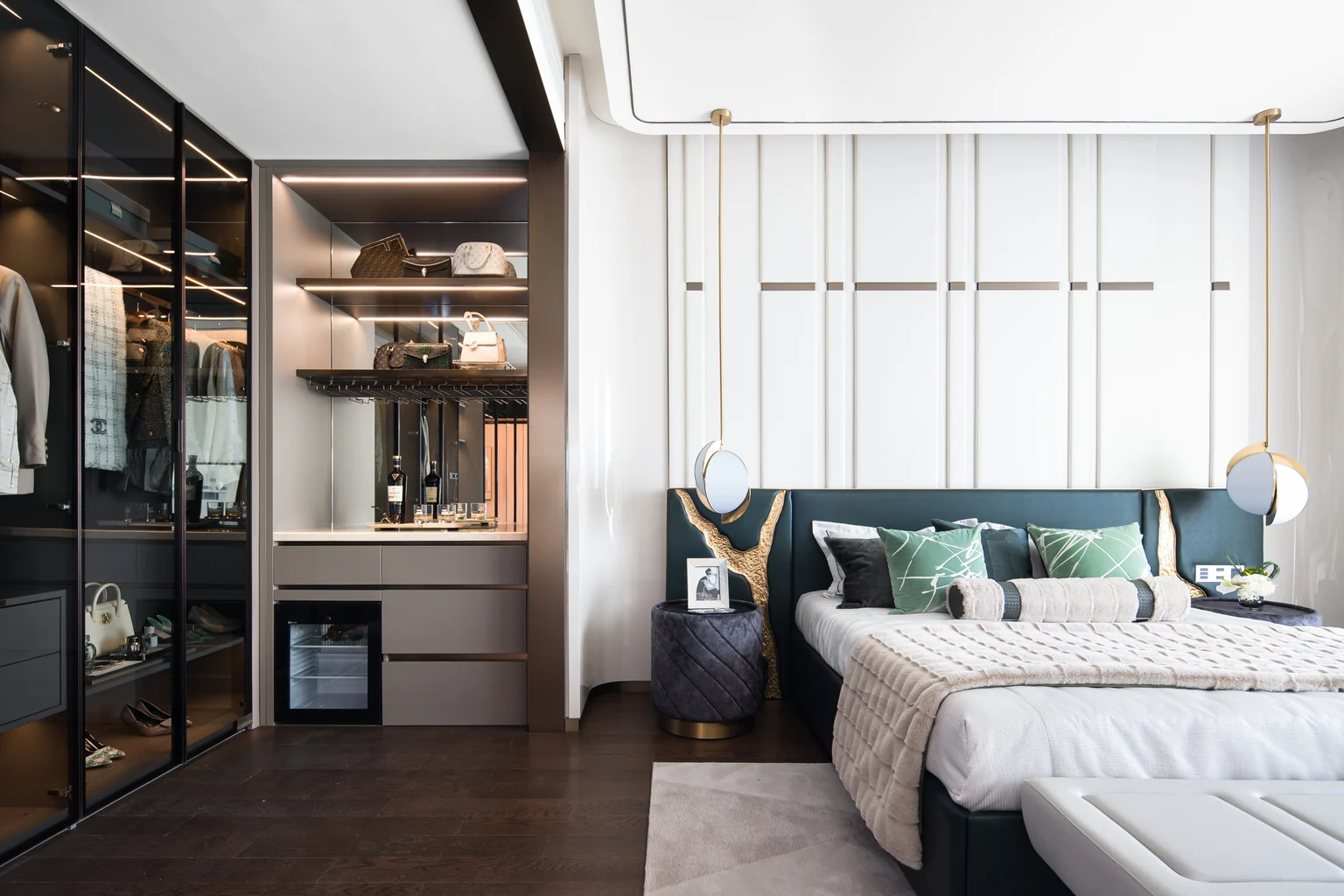 Completed primary bedroom and illuminated wardrobe in a United States private residence